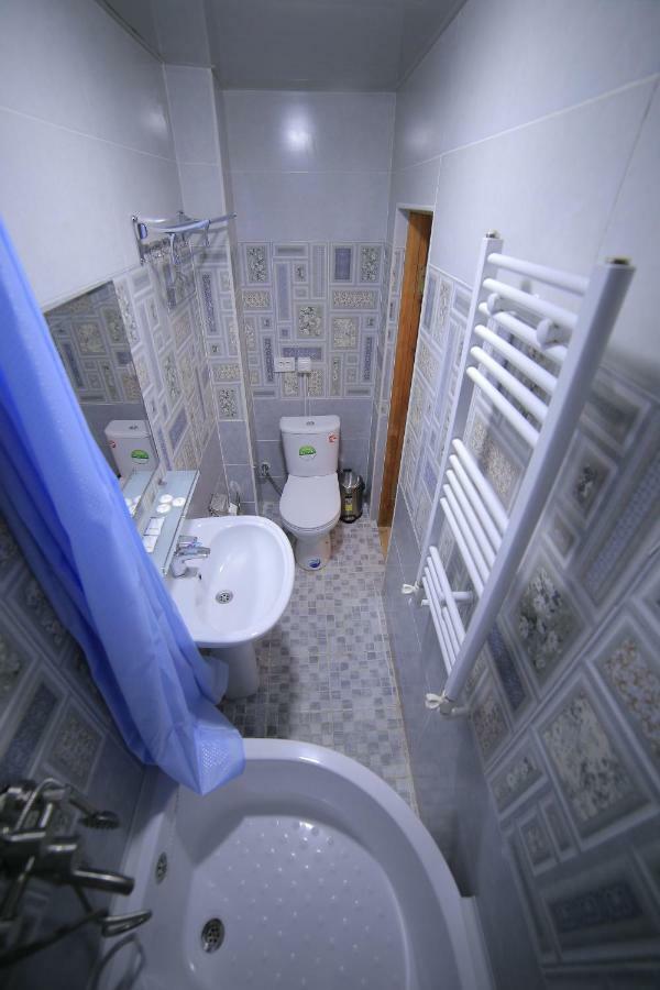 בוקורו Muslima Hotel מראה חיצוני תמונה